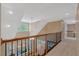 Spacious foyer with high ceilings, wooden railings, and ample natural light at 2201 Avinshire Pl, Wake Forest, NC 27587