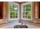 Modern kitchen features stainless sink, granite countertops, and lots of natural light at 2201 Avinshire Pl, Wake Forest, NC 27587