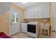 Clean laundry room with washer, dryer, sink and cabinets at 2201 Avinshire Pl, Wake Forest, NC 27587