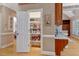 Spacious walk-in pantry boasts ample shelving for organized storage, plus an adjacent countertop workspace at 2201 Avinshire Pl, Wake Forest, NC 27587