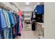 Well-organized walk-in closet with built-in shelving and hanging rods for ample storage at 2201 Avinshire Pl, Wake Forest, NC 27587