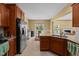 Spacious kitchen featuring a breakfast bar and stainless steel appliances at 244 N Prince Henry Way, Cameron, NC 28326