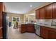 Spacious kitchen featuring a breakfast bar and stainless steel appliances at 244 N Prince Henry Way, Cameron, NC 28326
