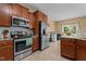 Well-equipped kitchen featuring stainless steel appliances and a breakfast bar at 244 N Prince Henry Way, Cameron, NC 28326