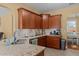 Well-equipped kitchen featuring stainless steel appliances and custom cabinetry at 244 N Prince Henry Way, Cameron, NC 28326