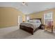 Serene main bedroom with vaulted ceiling, plush carpet, and comfortable furniture to wind down after a long day at 244 N Prince Henry Way, Cameron, NC 28326