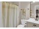 Full bathroom includes a toilet, vanity, and shower with curtain at 2637 Forestbluff Dr, Fuquay Varina, NC 27526