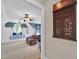 Spacious bonus room with custom built-ins, window seat, seating, and a unique architectural design at 2637 Forestbluff Dr, Fuquay Varina, NC 27526