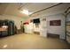 Bright and organized garage space with epoxy flooring and storage solutions at 2637 Forestbluff Dr, Fuquay Varina, NC 27526