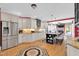 Spacious kitchen features stainless steel appliances, granite counters, and a central island with bar seating at 2637 Forestbluff Dr, Fuquay Varina, NC 27526