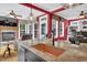 Bright living room with fireplace, hardwood floors, and large windows overlooking the backyard at 2637 Forestbluff Dr, Fuquay Varina, NC 27526