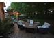 Cozy outdoor patio with a fire pit and comfortable seating, perfect for relaxing and enjoying the outdoors at 2637 Forestbluff Dr, Fuquay Varina, NC 27526