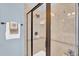 Bright and spacious shower with decorative tile border at 2637 Forestbluff Dr, Fuquay Varina, NC 27526