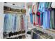 Organized walk-in closet features shelving, hanging rods, and ample storage space at 2637 Forestbluff Dr, Fuquay Varina, NC 27526