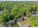 Aerial view showcases a beautiful home nestled in a lush, green neighborhood, highlighting its desirable location and curb appeal at 2908 Bolo Trl, Raleigh, NC 27615
