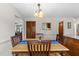 This dining room features a wooden table, chair set, and overhead light fixture for gatherings at 2908 Bolo Trl, Raleigh, NC 27615