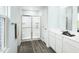 Modern bathroom with a glass-enclosed shower and a white vanity at 294 N Coral Bells Way, Four Oaks, NC 27524