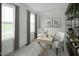 Comfortable home office with neutral decor and large windows for natural light at 294 N Coral Bells Way, Four Oaks, NC 27524