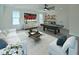 Spacious living room with modern decor, a pool table, and large windows at 3004 Eden Harbor Ct, Raleigh, NC 27613