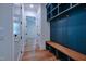 Well-organized mudroom with a built-in bench and cubbies for storage at 3004 Eden Harbor Ct, Raleigh, NC 27613