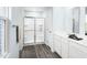 Clean bathroom featuring a glass-enclosed shower and modern vanity at 302 N Coral Bells Way, Four Oaks, NC 27524