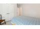 This bedroom features a double door closet and bright white trim at 304 Channel Cove Dr, Holly Springs, NC 27540