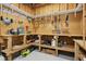 Well-organized garage with workbench, pegboard, and ample storage space at 308 Hassellwood Dr, Cary, NC 27518