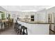 Bright kitchen with stainless steel appliances, a dark granite countertop, island with seating, and a breakfast nook at 308 Hassellwood Dr, Cary, NC 27518