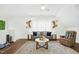 Living room with light walls and wood floors at 308 Hassellwood Dr, Cary, NC 27518