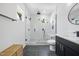 Modern bathroom featuring a glass shower, and sleek black fixtures and a stylish floating vanity at 310 Georgetown Rd, Raleigh, NC 27608