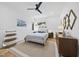Bright bedroom featuring a queen bed, stylish furnishings, and natural light from the window at 310 Georgetown Rd, Raleigh, NC 27608