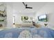 Cozy living room with plush seating, a large window, and a view of the exterior at 310 Georgetown Rd, Raleigh, NC 27608