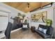 Well-lit office featuring modern decor, stylish furniture, and a wood-paneled ceiling for a comfortable work environment at 310 Georgetown Rd, Raleigh, NC 27608