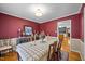 Formal dining room boasting an elegant table setting and stylish decor at 3126 Truitt Dr, Burlington, NC 27215