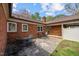 Large patio area for entertaining featuring brick exterior and covered area at 3126 Truitt Dr, Burlington, NC 27215