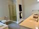 Bathroom features a double vanity, a glass-enclosed shower, and a toilet for convenience at 330 W King St, Hillsborough, NC 27278