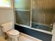 Bathroom with toilet and bath tub and shower at 330 W King St, Hillsborough, NC 27278