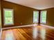 Bedroom featuring three large windows providing lots of natural light at 330 W King St, Hillsborough, NC 27278