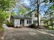 Exterior of a well-maintained home with mature trees at 330 W King St, Hillsborough, NC 27278