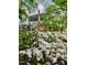 Exterior shot of home with a landscaped front yard and charming porch at 330 W King St, Hillsborough, NC 27278