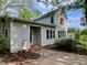 Charming home exterior with classic detailing, well-manicured landscaping, and a welcoming entrance at 330 W King St, Hillsborough, NC 27278