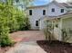 A beautifully designed brick patio that provides an excellent outdoor living space at 330 W King St, Hillsborough, NC 27278