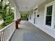 Large, open front porch with seating, offering a relaxing outdoor space at 330 W King St, Hillsborough, NC 27278
