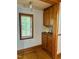 Bright room with built-in cabinets, and an exterior window at 330 W King St, Hillsborough, NC 27278