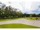 Expansive backyard with healthy green lawn and meticulously maintained landscaping and hardscape at 337 Sunset Hill Ln, Wendell, NC 27591