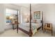 Cozy bedroom with four poster bed and sunny window at 337 Sunset Hill Ln, Wendell, NC 27591