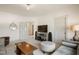 Bright and airy living room with modern decor and neutral color palette at 337 Sunset Hill Ln, Wendell, NC 27591
