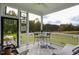 Relaxing screened porch with comfortable seating and scenic view at 337 Sunset Hill Ln, Wendell, NC 27591