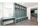 Well-organized mudroom with built-in lockers, bench seating, and ample storage space for a tidy entryway at 3521 Banks Rd, Raleigh, NC 27603