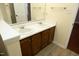 Bright bathroom featuring double vanity and updated fixtures at 3521 Piedmont Dr, Raleigh, NC 27604